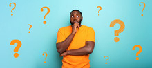 A thoughtful Black man in an orange shirt stands against a teal background, surrounded by orange question marks. He looks up with his hand on his chin. Text: MOCKUP.