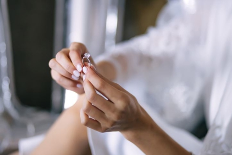 Woman holding a diamond ring