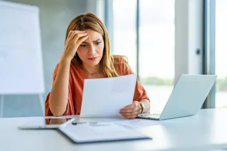 Women looking at documents on her table