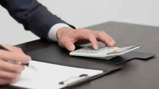 Going over costs with a calculator