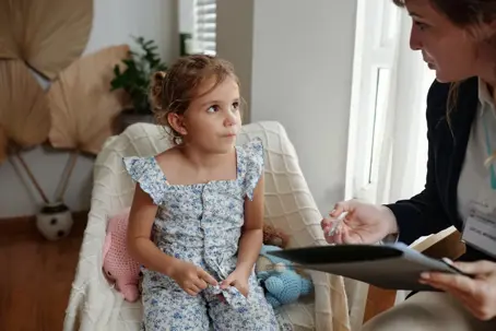 Child talking to social worker