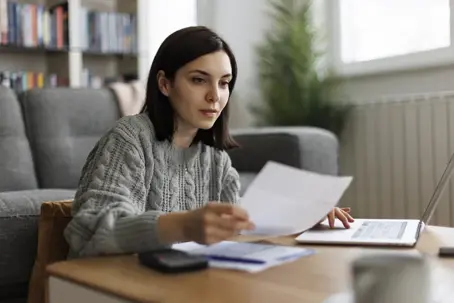 Women looking at documents on her table