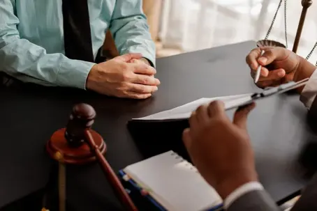 Lawyer in meeting with client