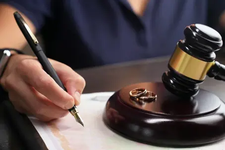 Wedding rings on top of a gavel