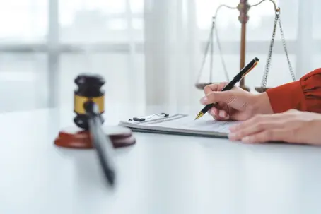 Lawyer filling out paper work