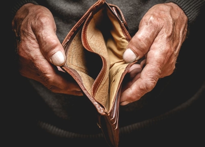 older person without any money in their wallet